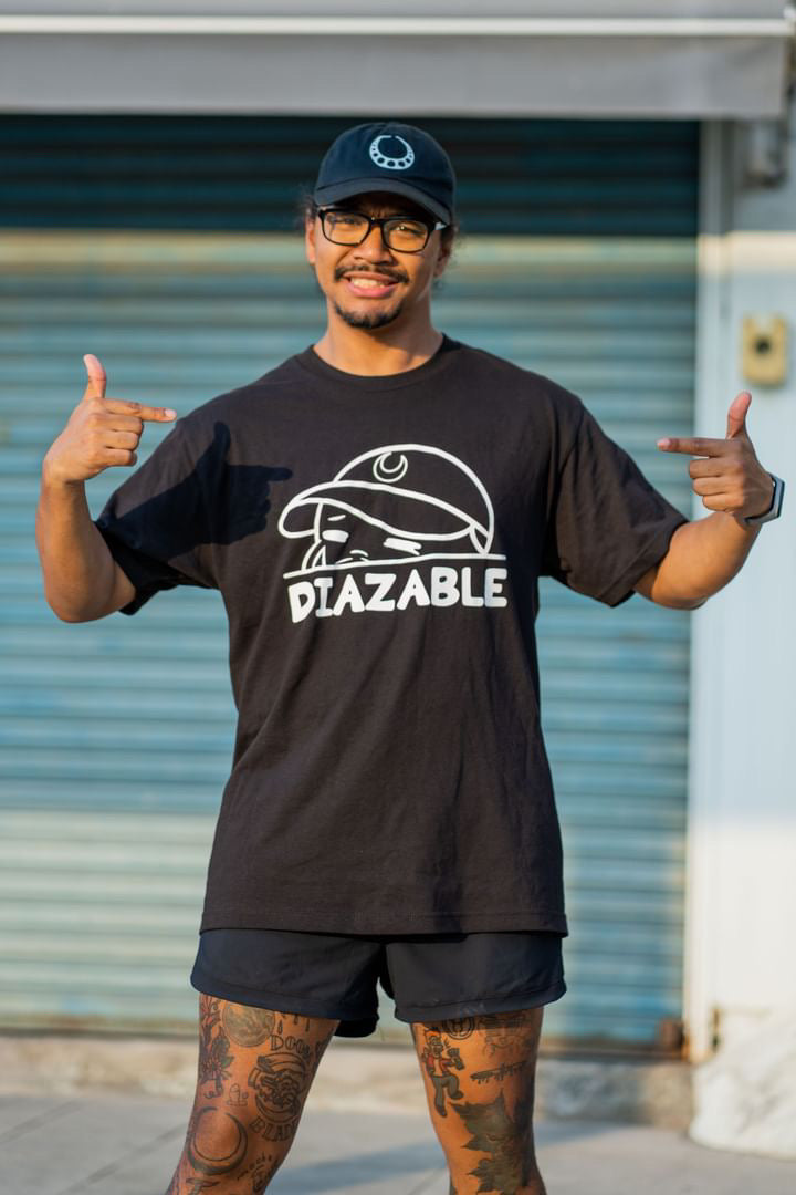 Discover Diazable's 'Crying But Trying' Kewpie clothing, blending millennial humor with unique designs. Based in San Antonio, Texas, our small business brings top-quality apparel to fans in Texas and Korea. Embrace your style with Diazable.