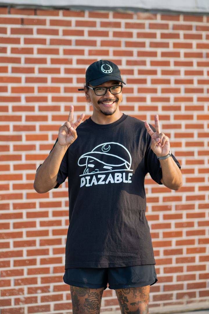 Discover Diazable's 'Crying But Trying' Kewpie clothing, blending millennial humor with unique designs. Based in San Antonio, Texas, our small business brings top-quality apparel to fans in Texas and Korea. Embrace your style with Diazable.