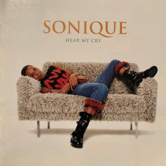 Explore Sonique's debut album 'Hear My Cry' in this review. Delve into the British star's blend of R&B and trance from the vibrant 90s and 2000s music scene.